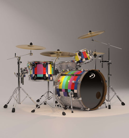 Colorful drum set on a gray background