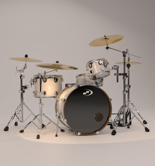 White drum set with black bass drum and chrome hardware on a gray background
